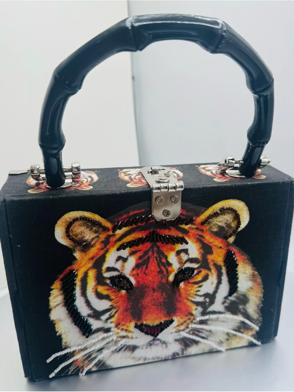 Unique bamboo handle clutch.